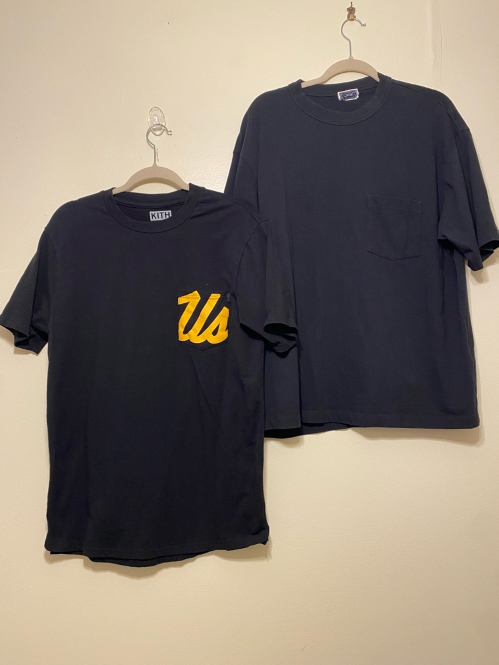 Kith Black Short-Sleeve Tee with Yellow "Us" Chest Logo. Size L